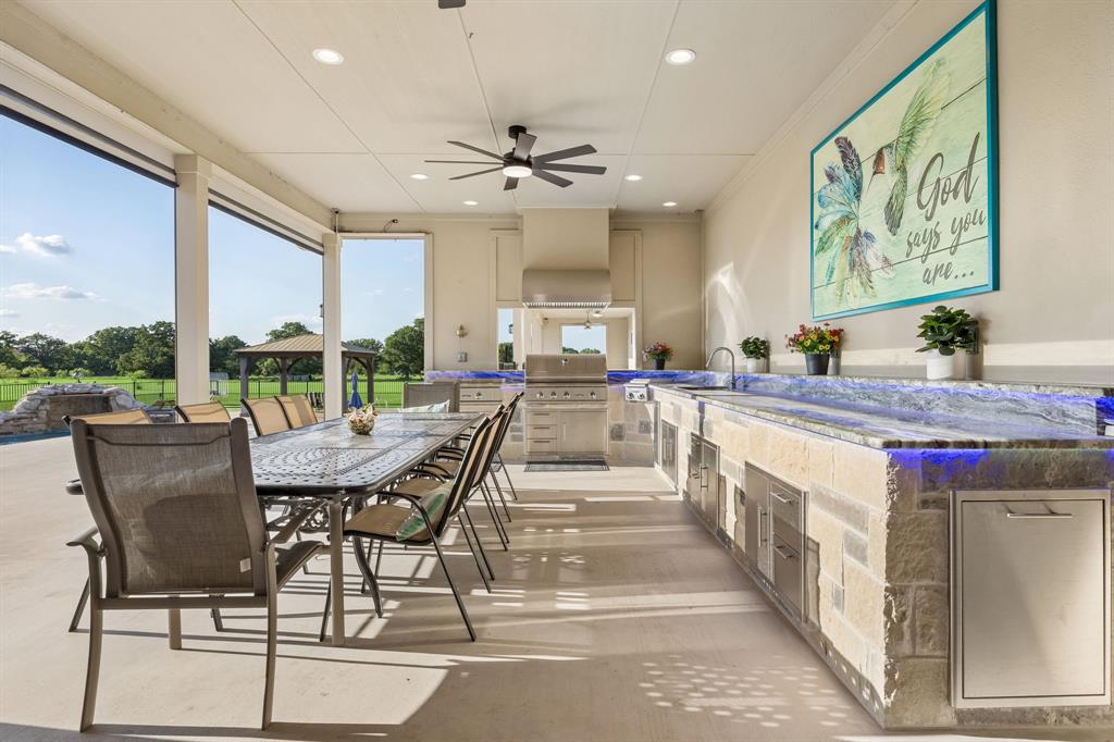 174 King Ranch Court Fort Worth, TX 76108 - Photo 31 of 40 Enjoy dining Alfresco in your covered patio area with outdoor kitchen area.