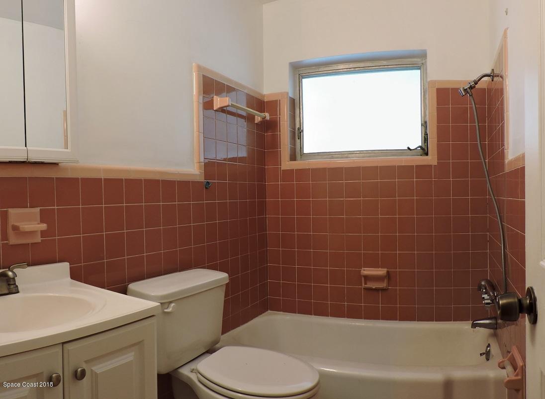 2374 Shenandoah Road Palm Bay, FL 32905 - Photo 9 of 17 Hall Bathroom