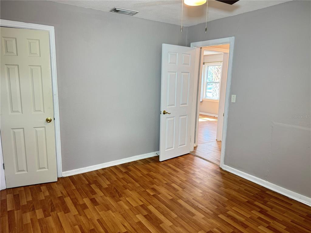 1009 Druid Road Clearwater, FL 33756 - Photo 7 of 9 a view of an empty room and window