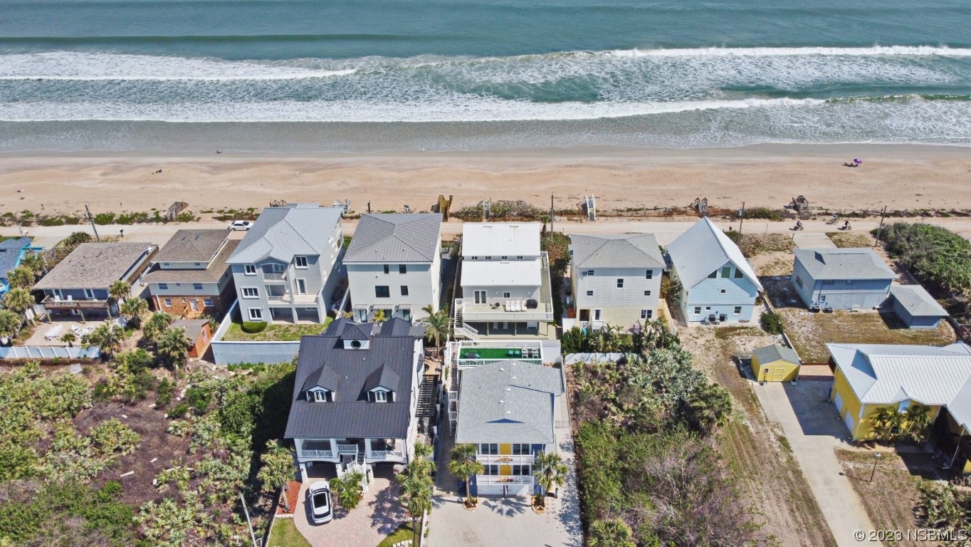 6531 Turtlemound Road New Smyrna Beach, FL 32169 - Photo 3 of 42 an aerial view of multiple house