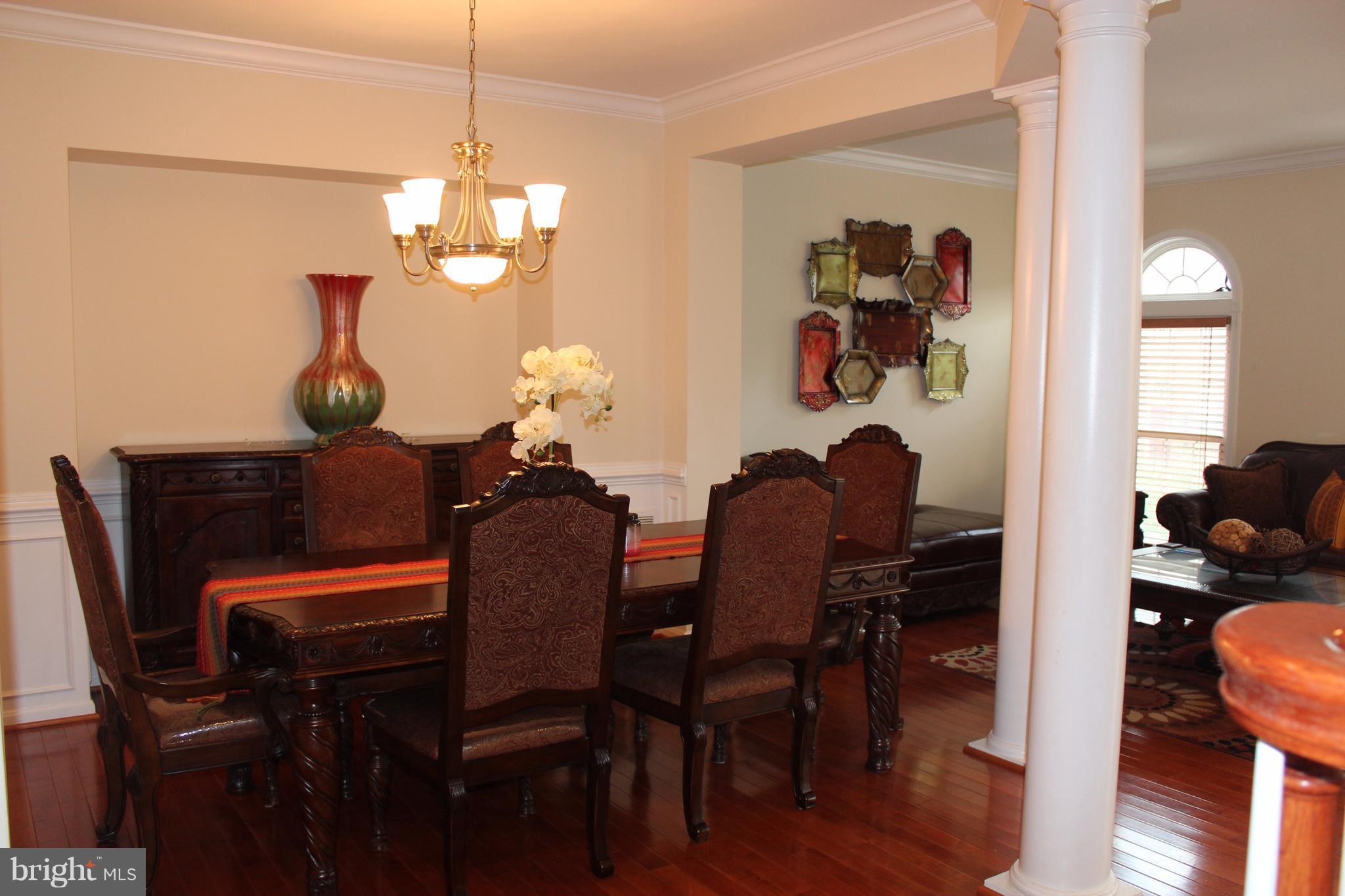 9168 Furey Road Lorton, VA 22079 - Photo 5 of 29 fancy dining with columns