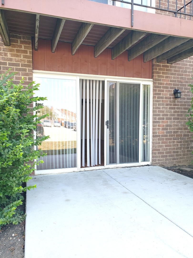 10369 Dearlove Road, Unit 1C Glenview, IL 60025 - Photo 9 of 9 a view of a balcony with door