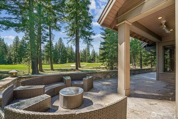 a view of a patio with a table chairs and a patio