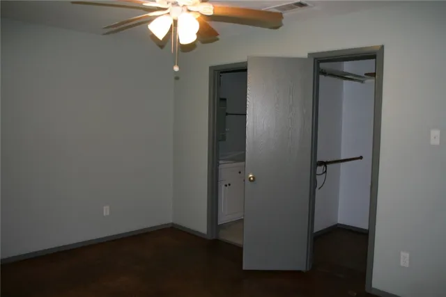 an empty room with a mirror