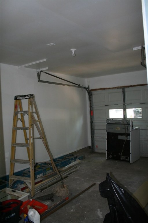 103 Cloudview Drive, Unit A Austin, TX 78745 - Photo 16 of 17 a room with exposed pipes and a window