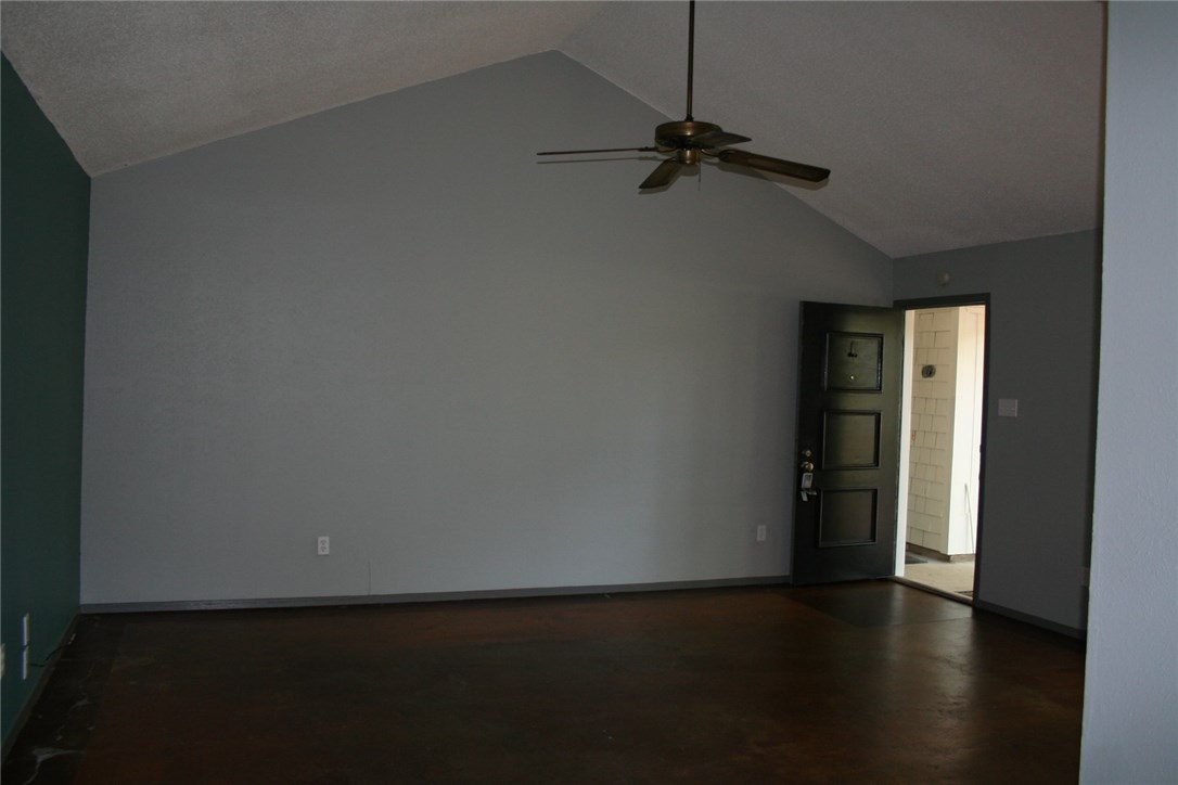 103 Cloudview Drive, Unit A Austin, TX 78745 - Photo 2 of 17 a view of an empty room with a window