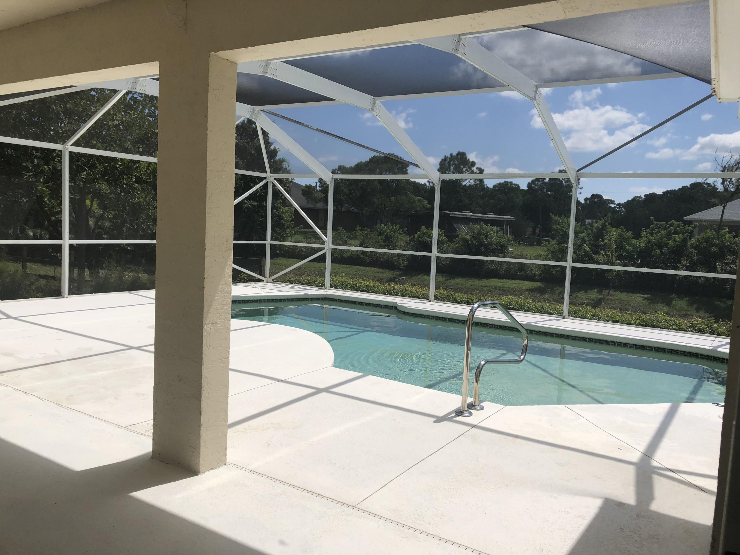 15440 76th Road North Loxahatchee, FL 33470 - Photo 21 of 169 QO6y2BDBQeqIBi38KU+lQw