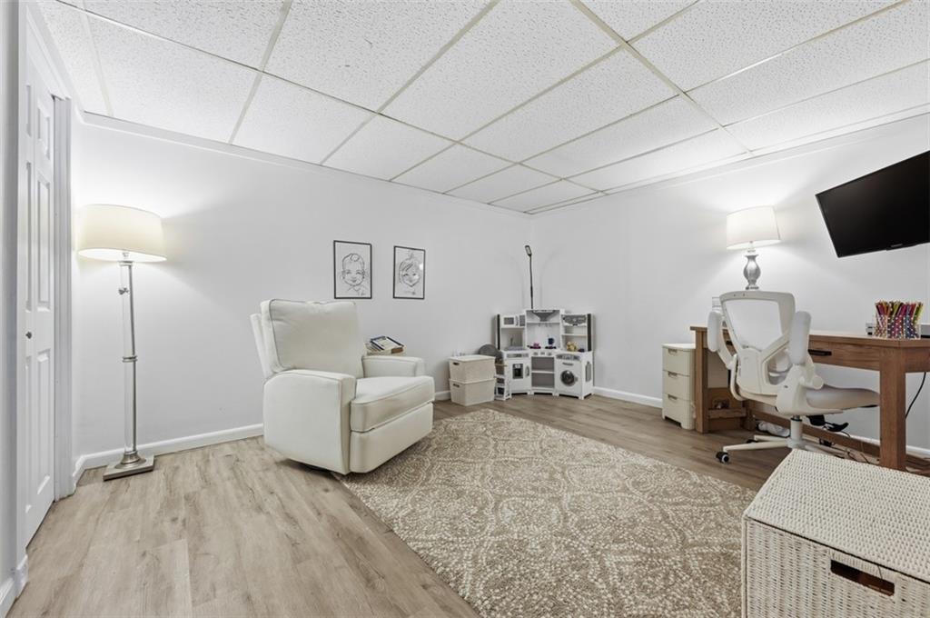 129 Meadowbrook Road Renfrew, PA 16053 - Photo 22 of 45 a living room with furniture and a flat screen tv