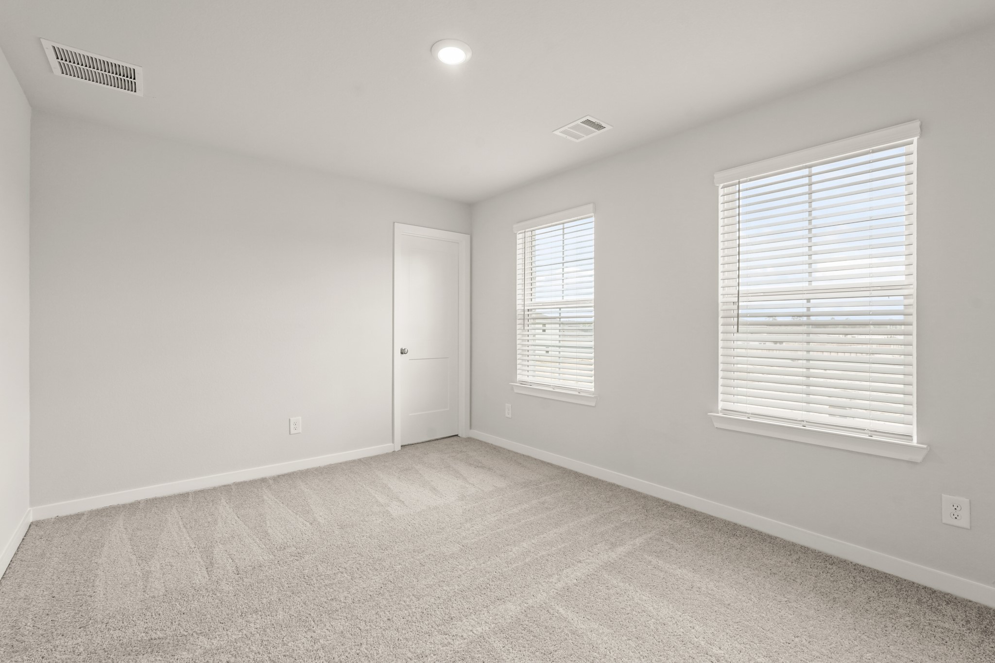 113 Rising Cedar Lane Hockley, TX 77447 - Photo 20 of 27 a view of an empty room with a window