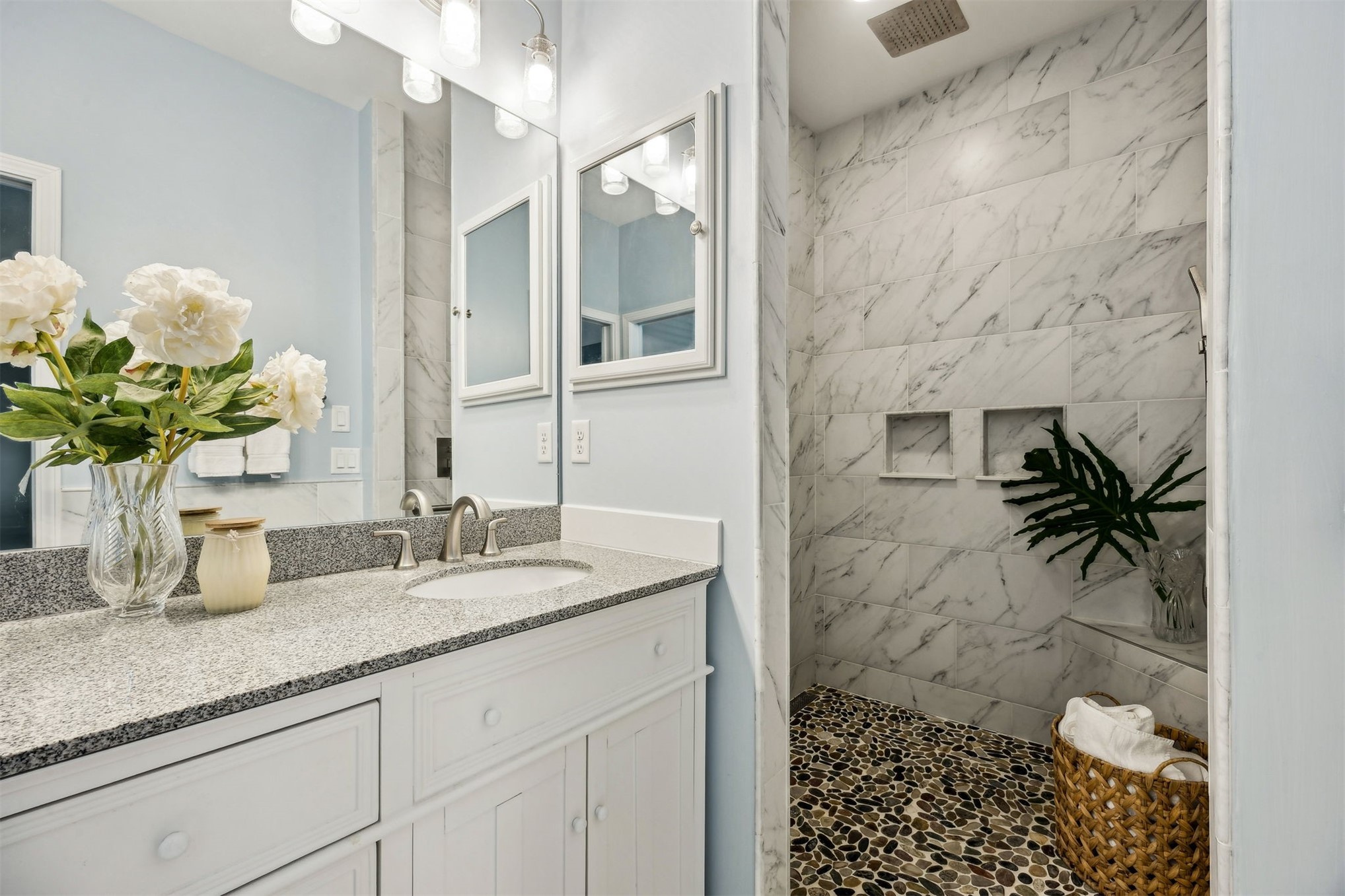307 Elm Street Fernandina Beach, FL 32034 - Photo 17 of 35 a bathroom with a granite countertop sink a toilet and a mirror