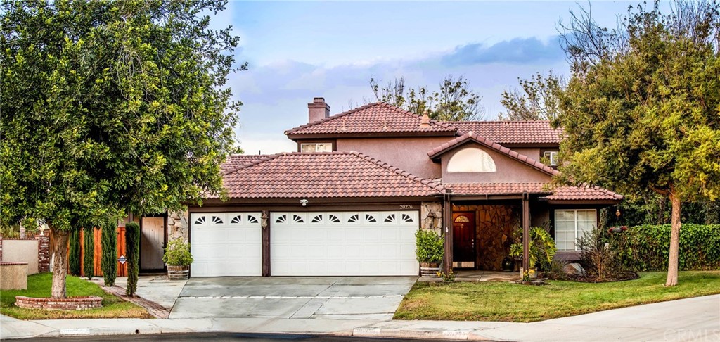 20276 June Court Riverside, CA 92508 - Photo 1 of 1 Beautifully Landscaped Front view, 2 separate entrances, (1) Main Entrance on the right and (2) Granny/Mother-in-Law entrance on the left side of the garage