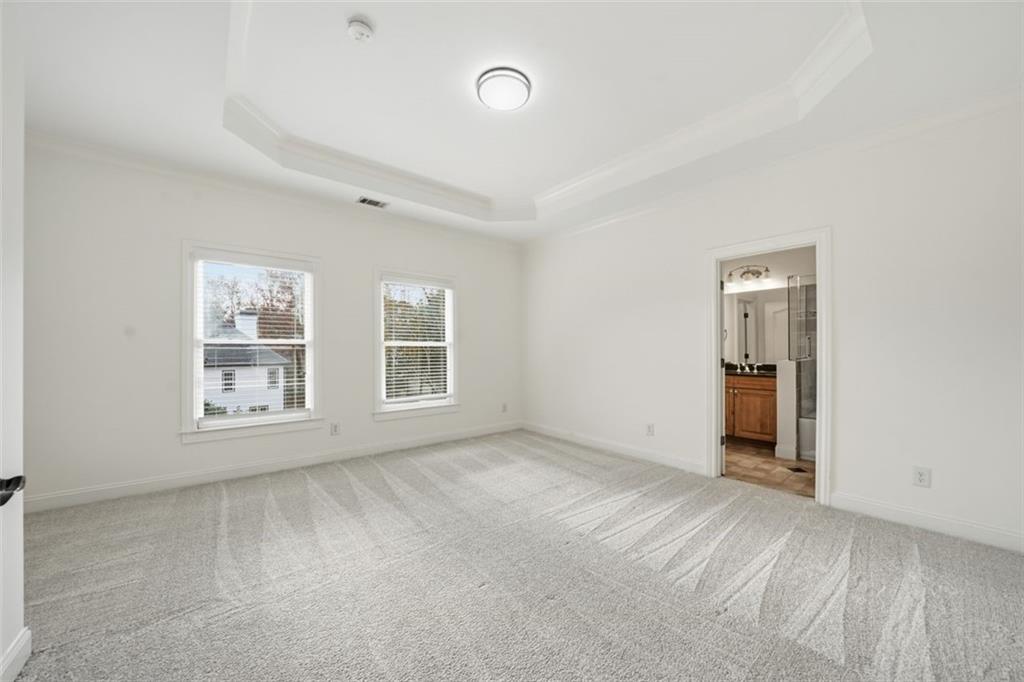 7611 Regency Circle Sandy Springs, GA 30350 - Photo 35 of 74 an empty room with windows