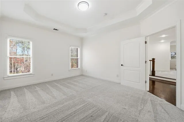 a view of kitchen with cabinets and wooden floor