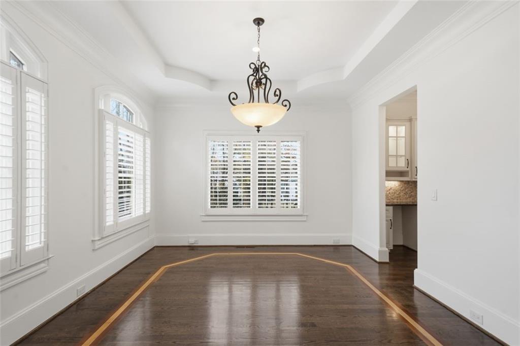 7611 Regency Circle Sandy Springs, GA 30350 - Photo 4 of 74 a view of an empty room with a window