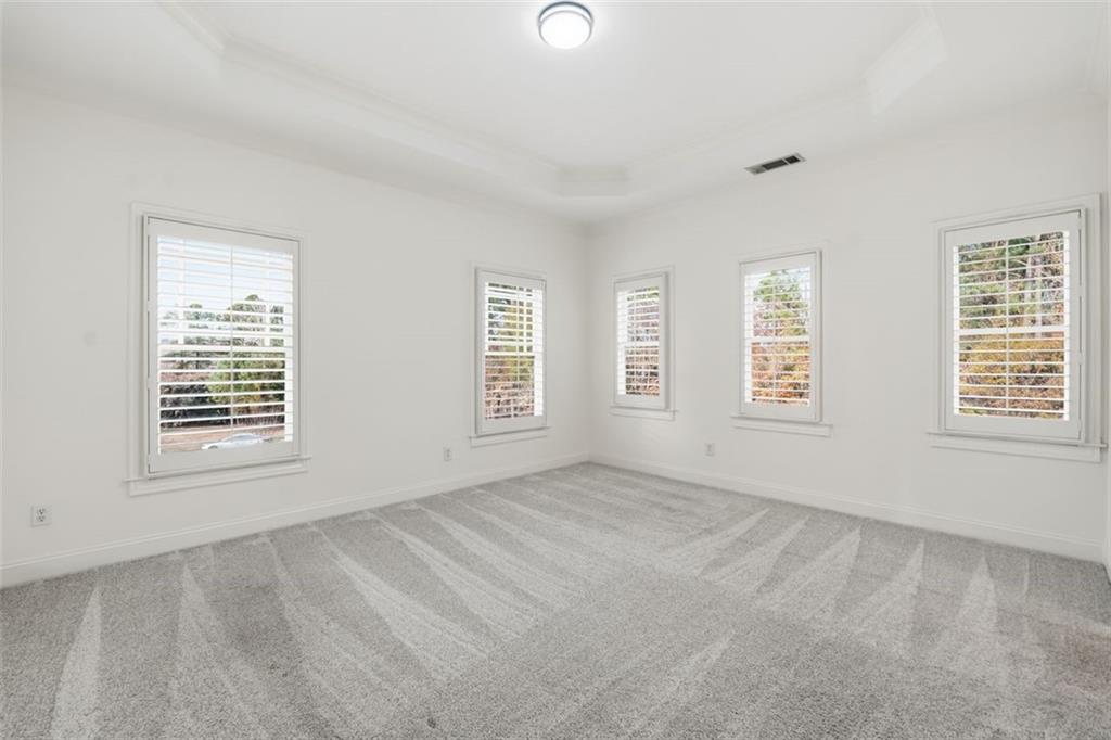 7611 Regency Circle Sandy Springs, GA 30350 - Photo 42 of 74 an empty room with windows