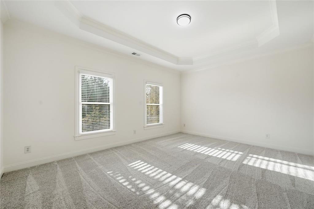 7611 Regency Circle Sandy Springs, GA 30350 - Photo 47 of 74 an empty room with windows