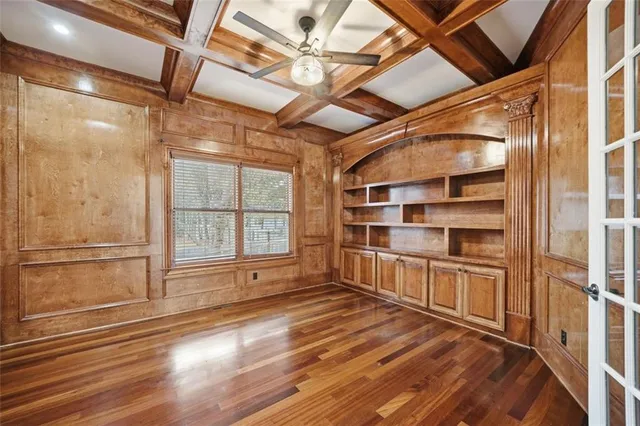 a kitchen with stainless steel appliances granite countertop a sink a stove and a granite counter tops
