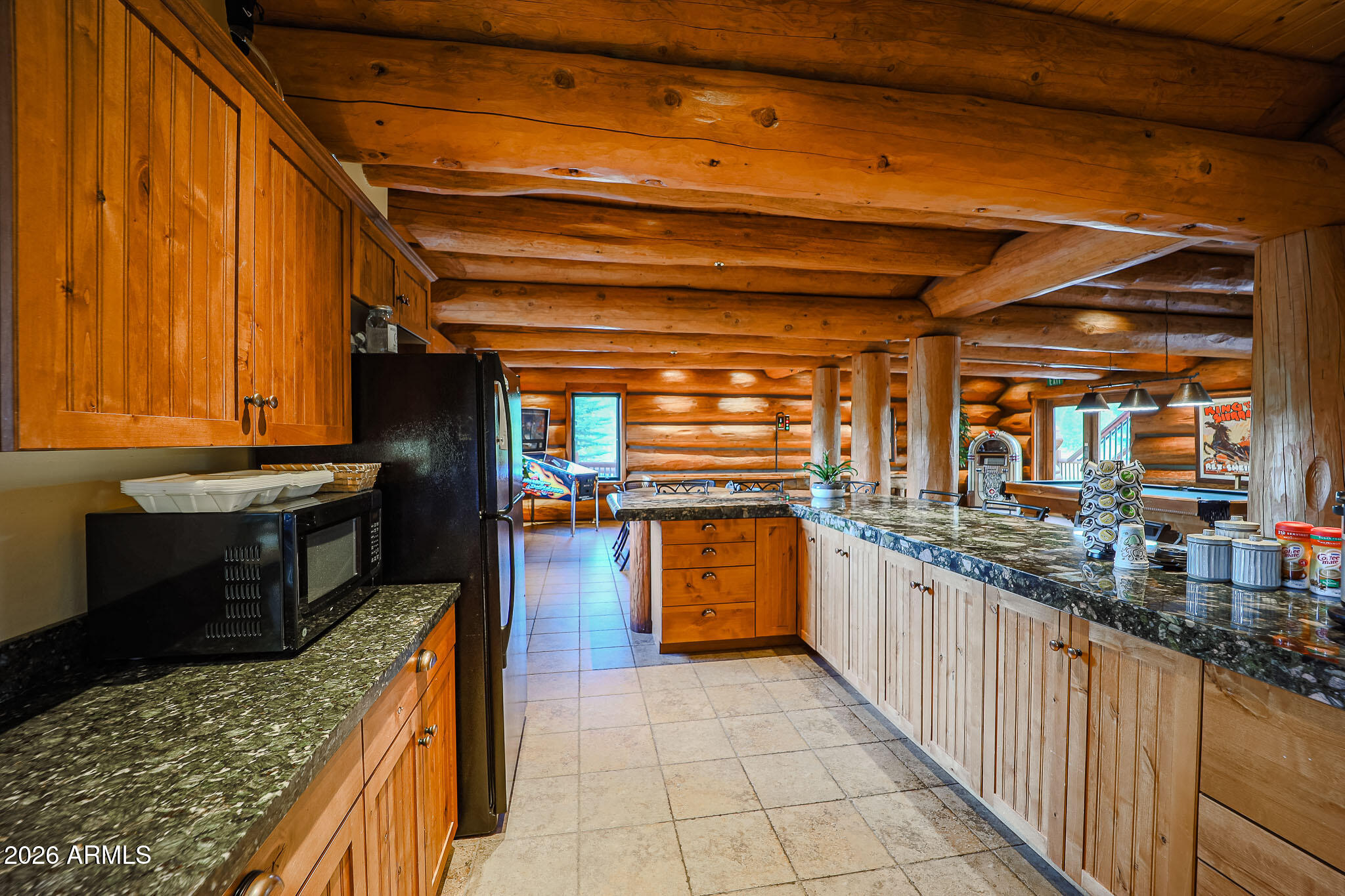 405 East Foxboro Road Munds Park, AZ 86017 - Photo 118 of 131 a kitchen with stainless steel appliances granite countertop a sink and cabinets