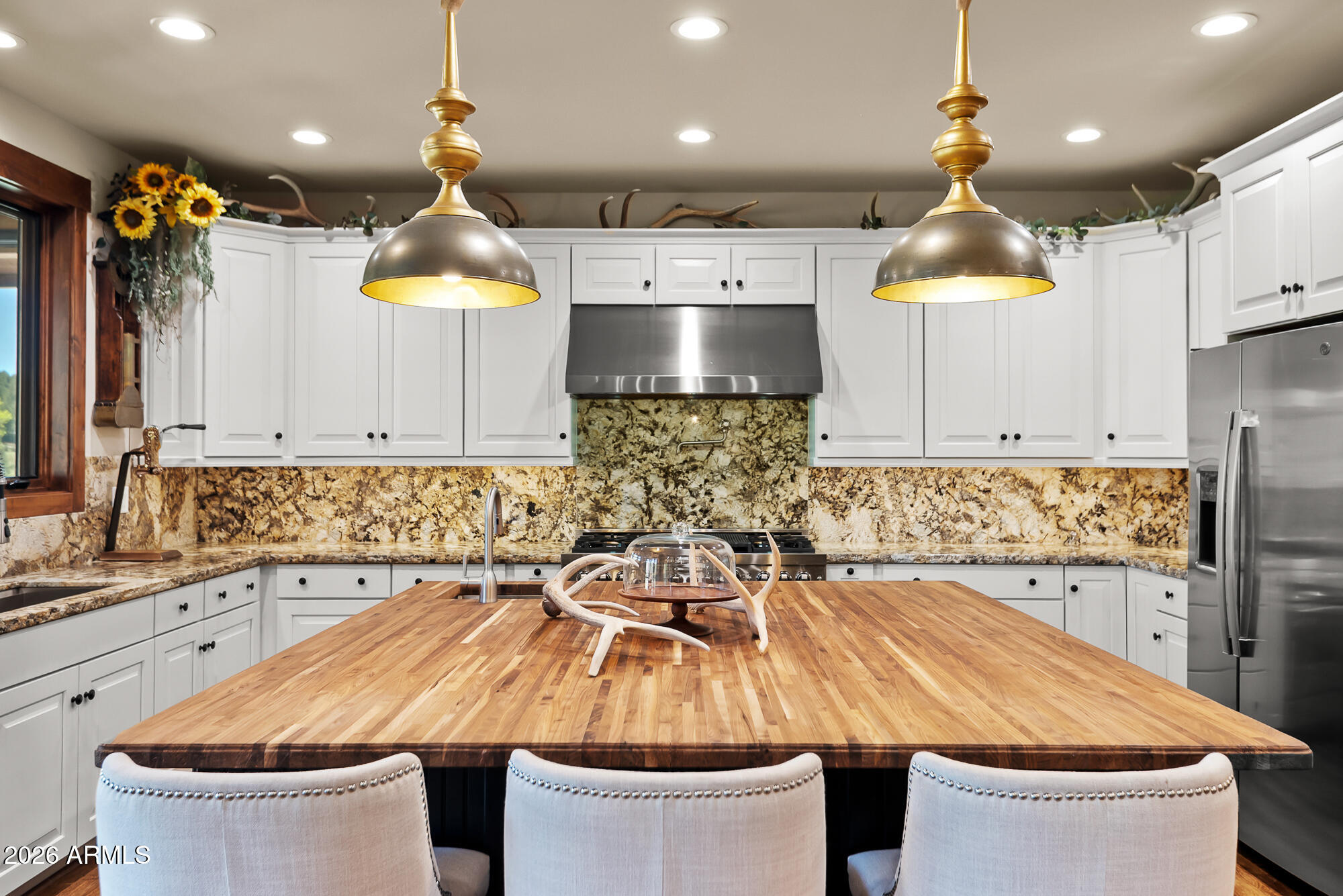 405 East Foxboro Road Munds Park, AZ 86017 - Photo 21 of 131 a kitchen with a sink and a stove