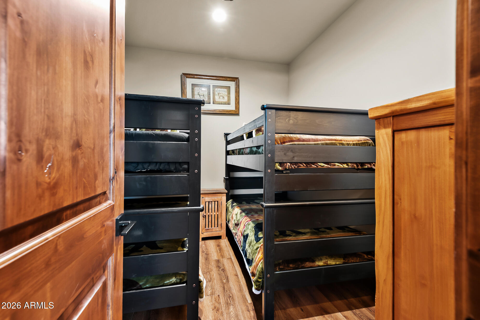 405 East Foxboro Road Munds Park, AZ 86017 - Photo 35 of 131 a view of walk in closet with clothes and shoes
