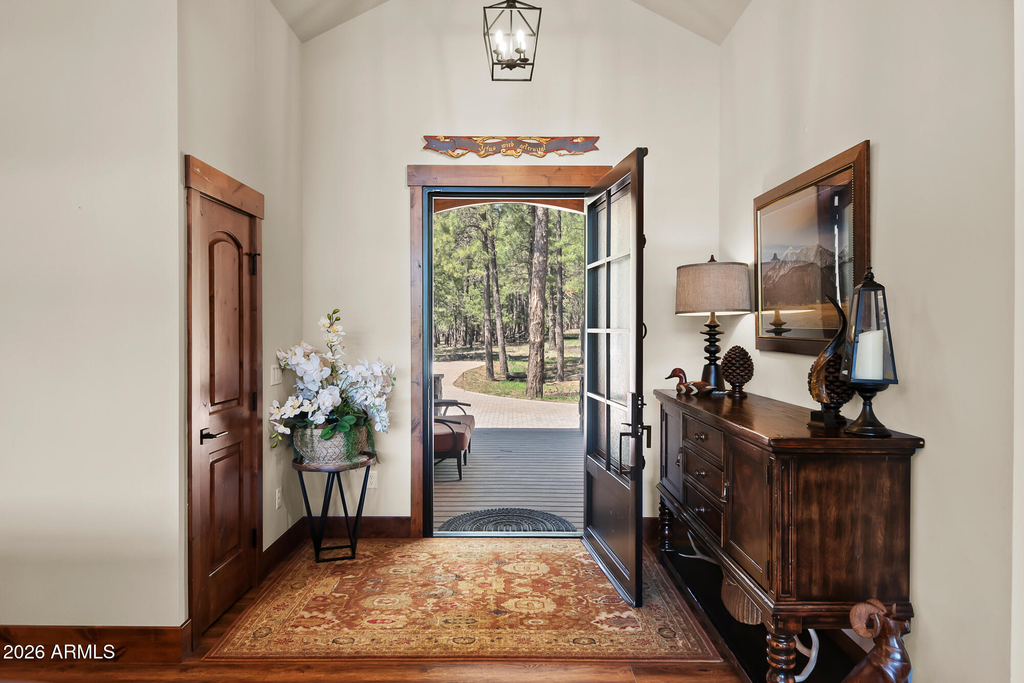 405 East Foxboro Road Munds Park, AZ 86017 - Photo 45 of 131 a view of a hallway with workspace and windows