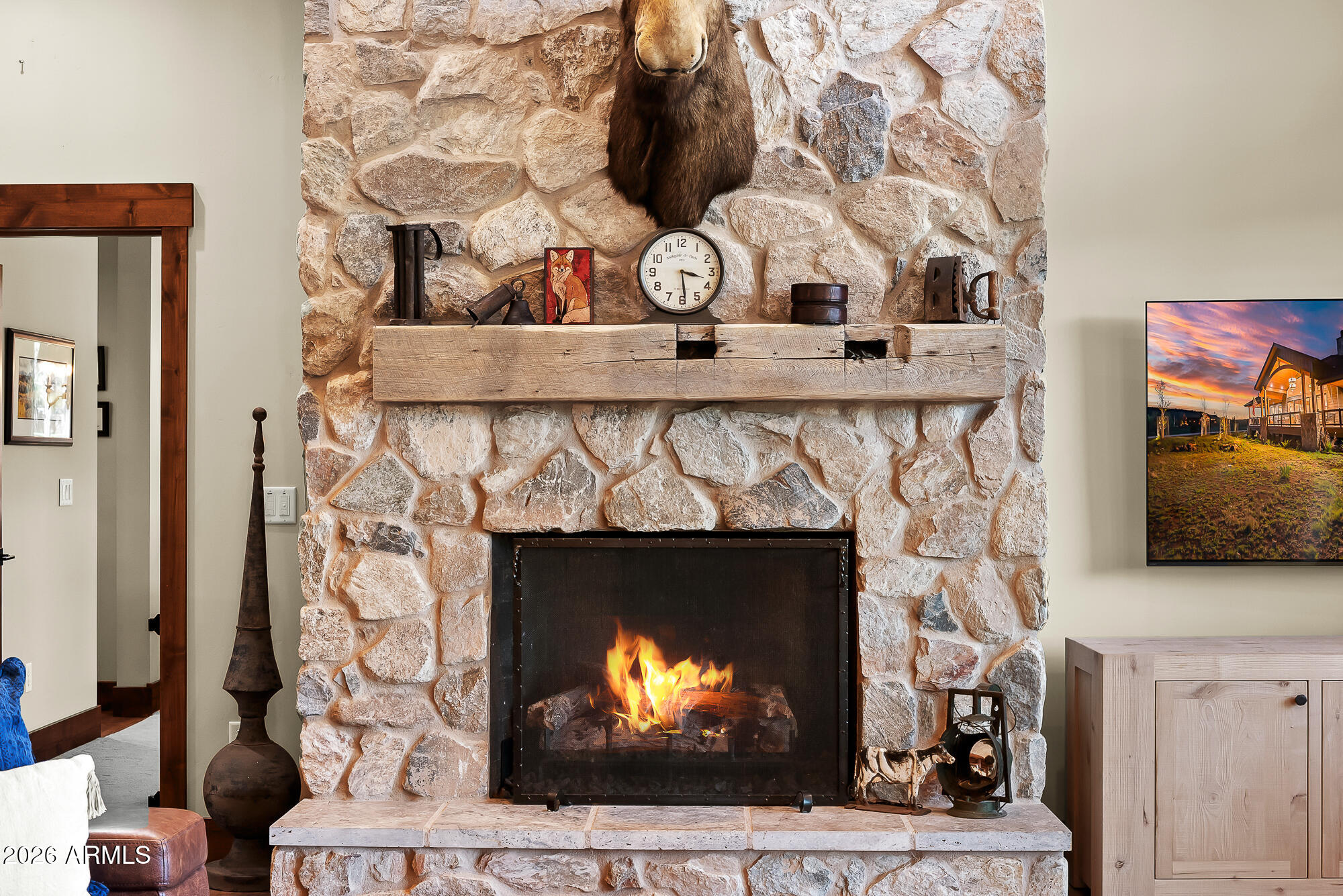 405 East Foxboro Road Munds Park, AZ 86017 - Photo 47 of 131 a fireplace with a clock on it