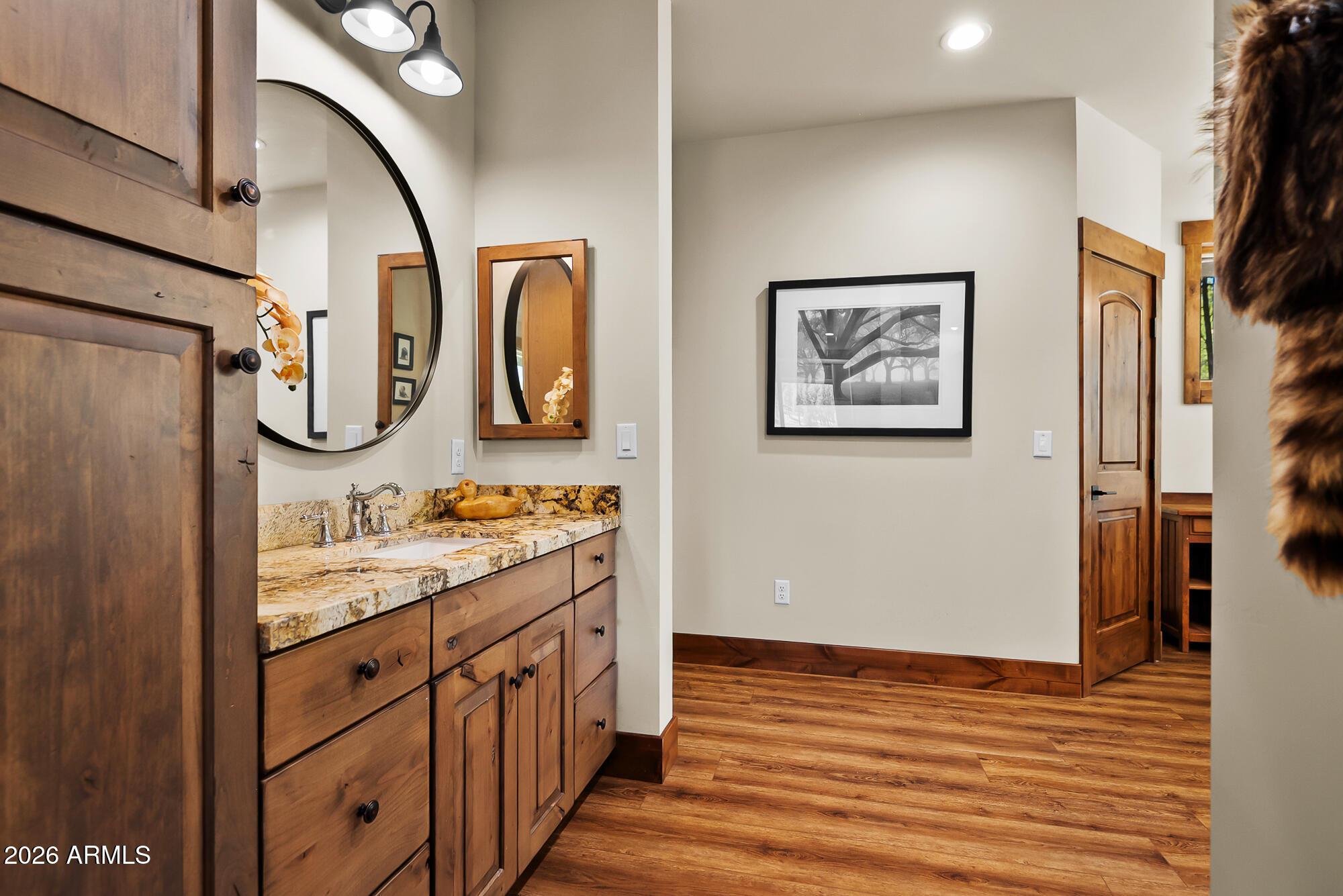 405 East Foxboro Road Munds Park, AZ 86017 - Photo 51 of 131 a bathroom with a double vanity sink mirror and shower