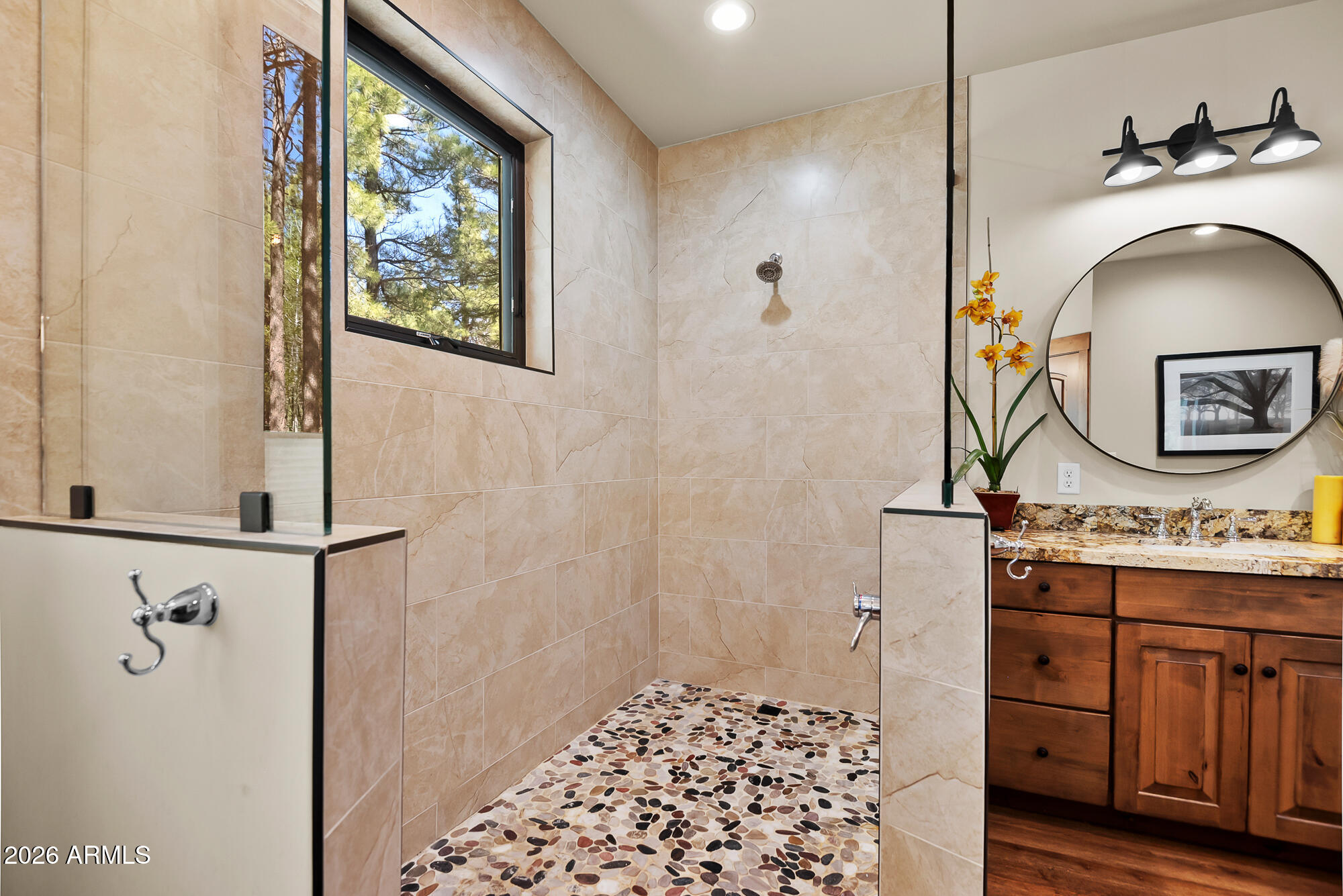 405 East Foxboro Road Munds Park, AZ 86017 - Photo 53 of 131 a bathroom with a sink and a mirror