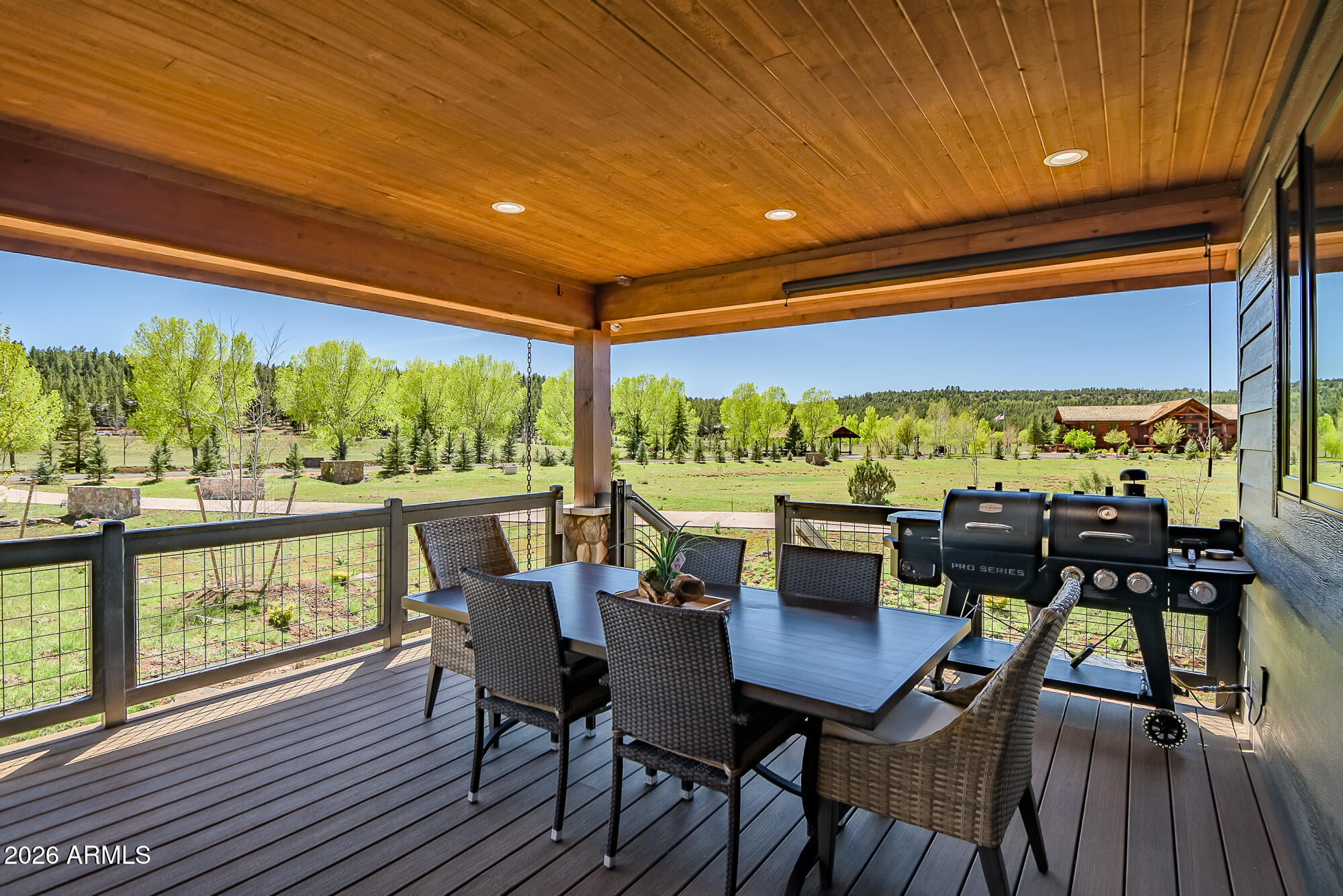 405 East Foxboro Road Munds Park, AZ 86017 - Photo 71 of 131 a view of a dining room with furniture window and outside view