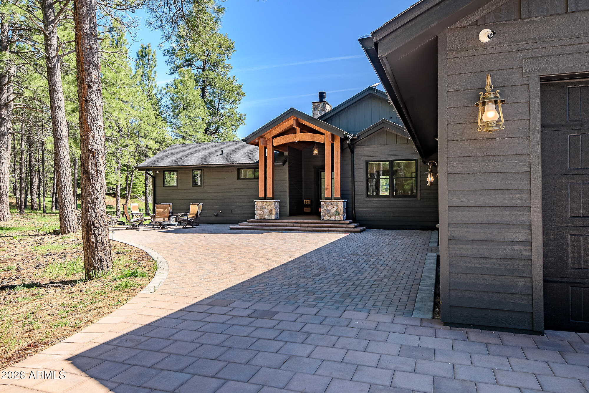 405 East Foxboro Road Munds Park, AZ 86017 - Photo 85 of 131 a front view of a house with a yard