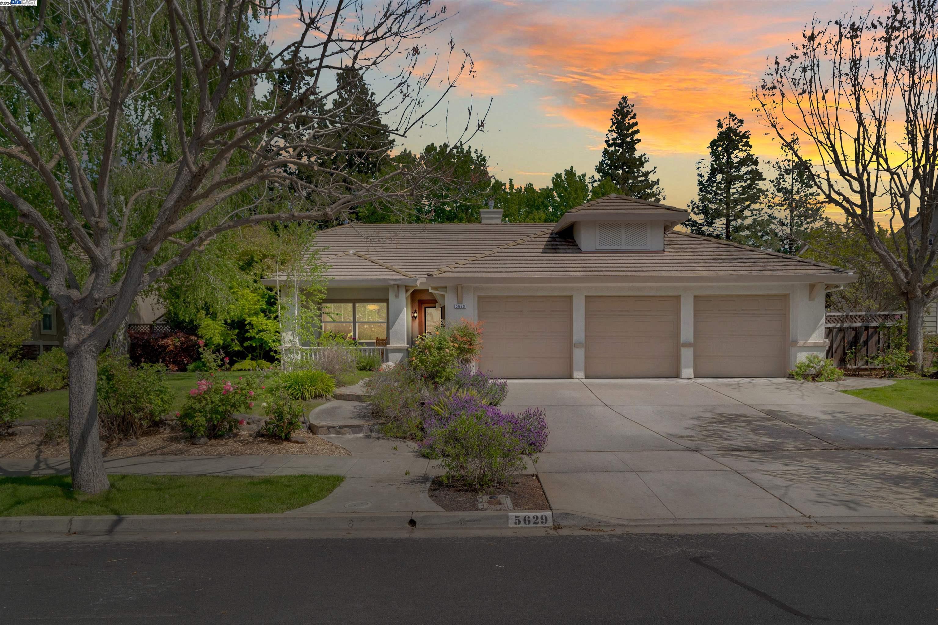 5629 Arlene Way Livermore, CA 94550 - Photo 1 of 1 a front view of a house with a yard and a garage