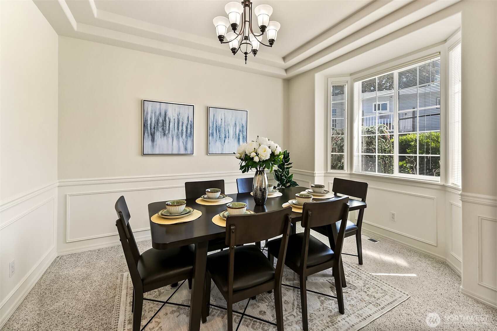 20604 Damson Road Lynnwood, WA 98036 - Photo 6 of 24 a view of a dining room with furniture and chandelier