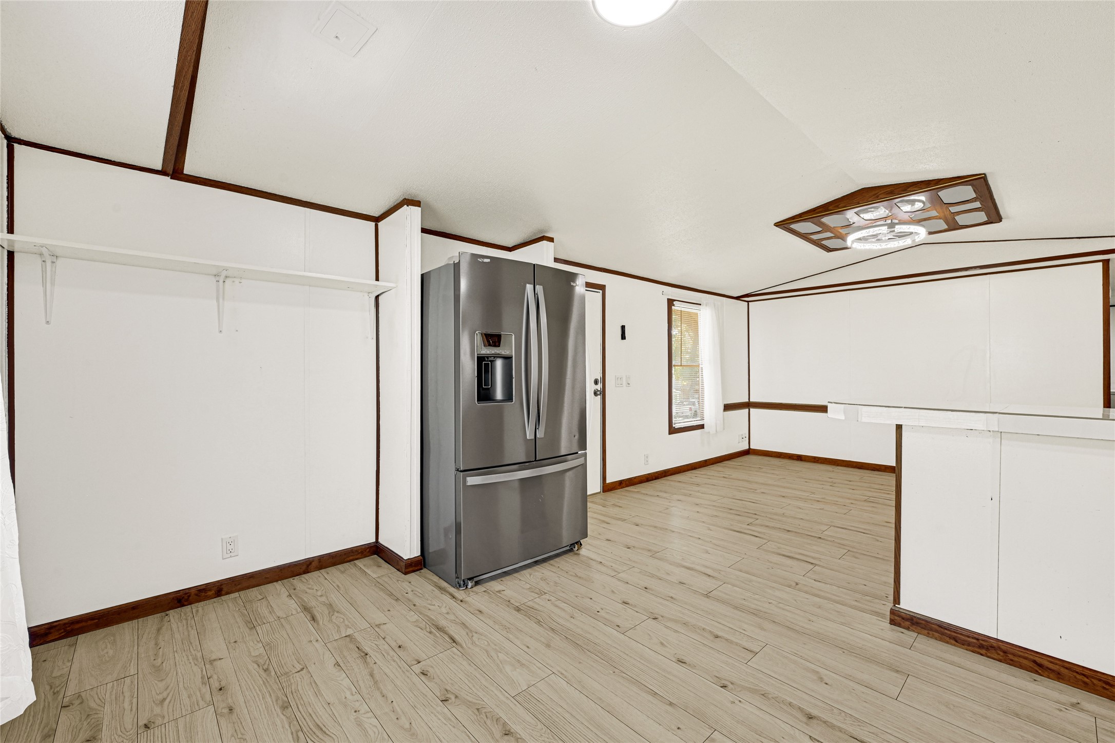 16794 Balmoral Street Montgomery, TX 77316 - Photo 12 of 24 a view of a room with wooden floor