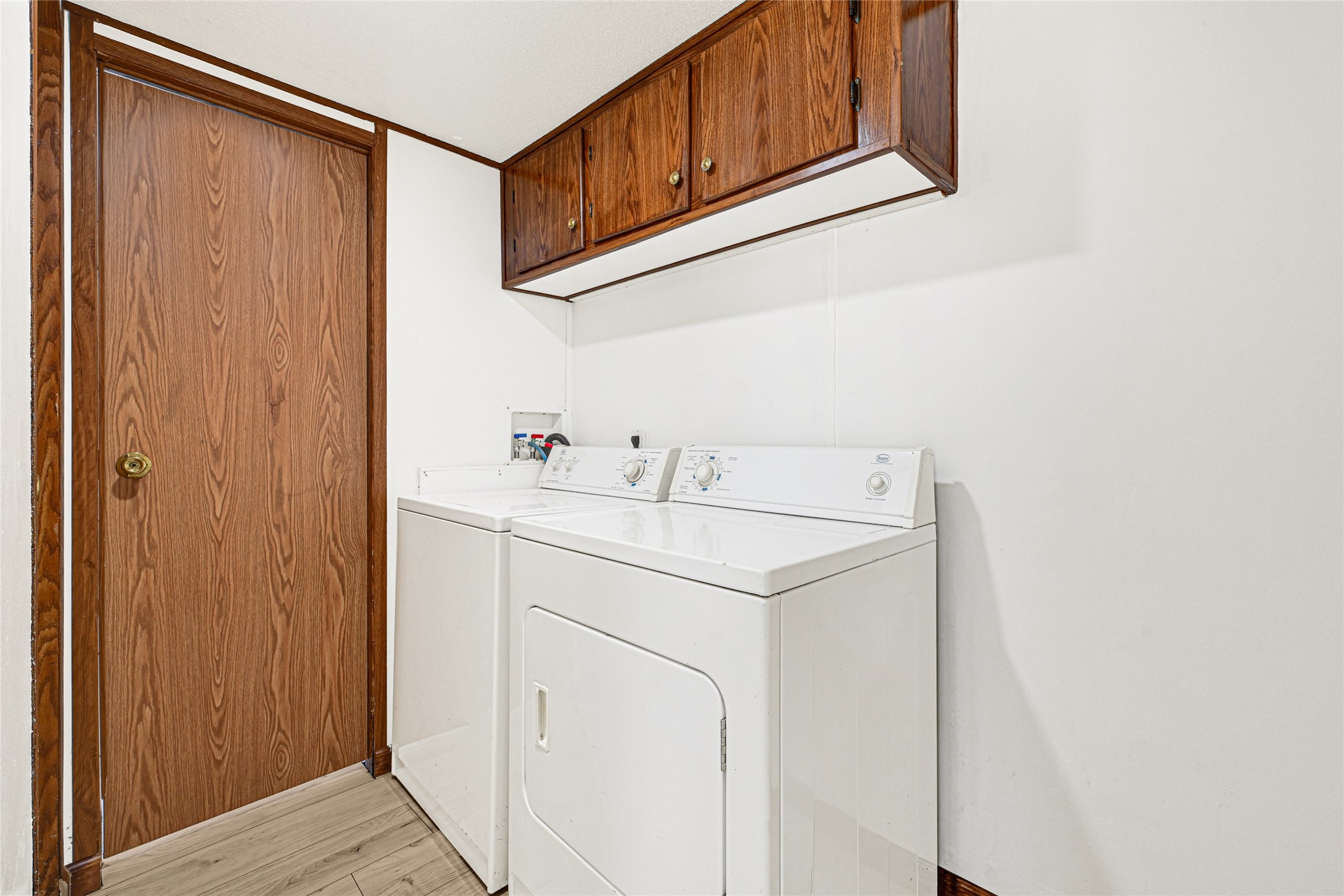16794 Balmoral Street Montgomery, TX 77316 - Photo 14 of 24 a utility room with dryer and washer