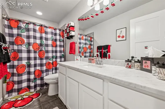 a kitchen with a cabinets and white appliances