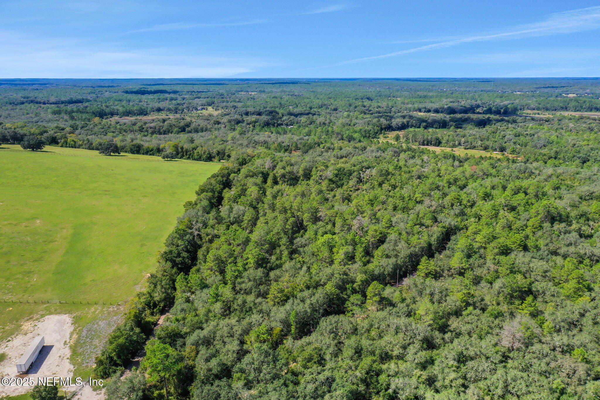 0 Old Bundy Lake Road Melrose, FL 32666 - Photo 4 of 13 a view of a field with an ocean