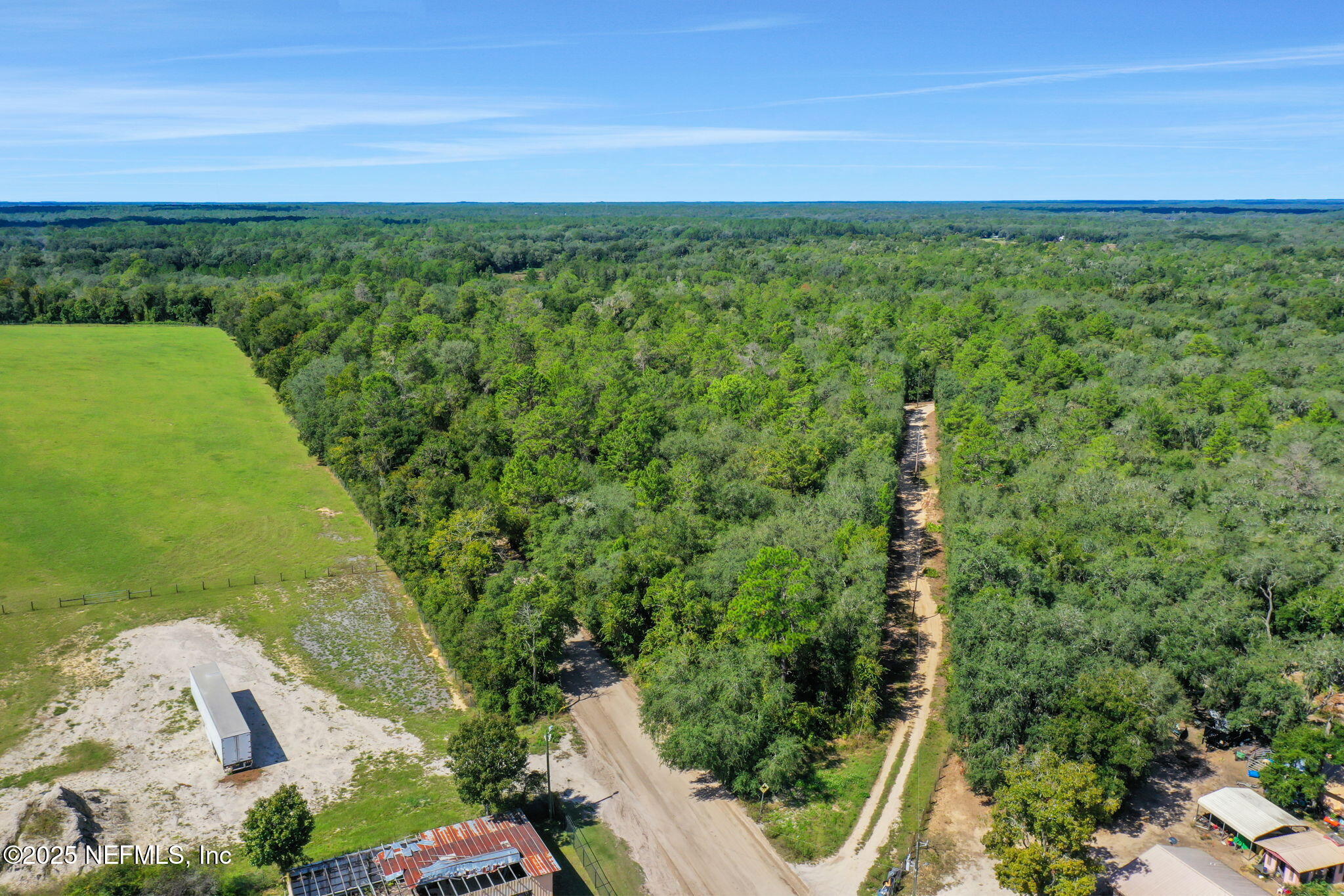 0 Old Bundy Lake Road Melrose, FL 32666 - Photo 8 of 13 a view of a field with an ocean