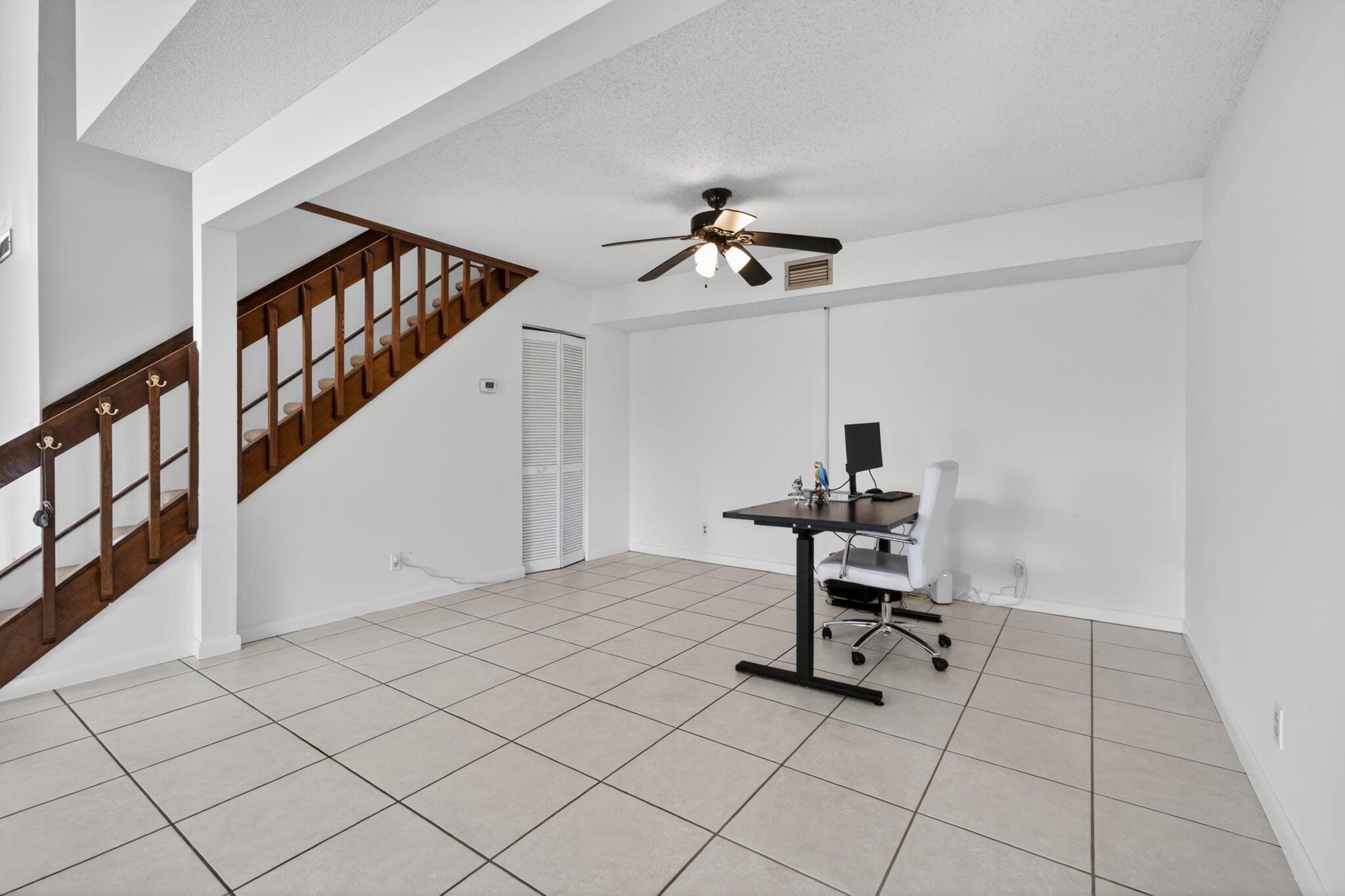 102 Maplecrest Circle Jupiter, FL 33458 - Photo 17 of 39 extra large great room below the loft