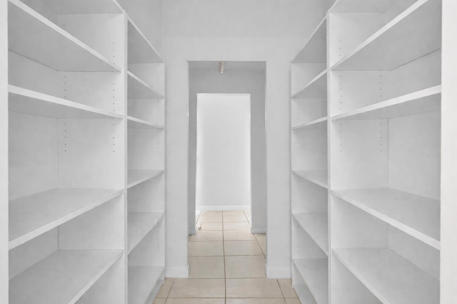 102 Maplecrest Circle Jupiter, FL 33458 - Photo 19 of 39 1st walkin closet