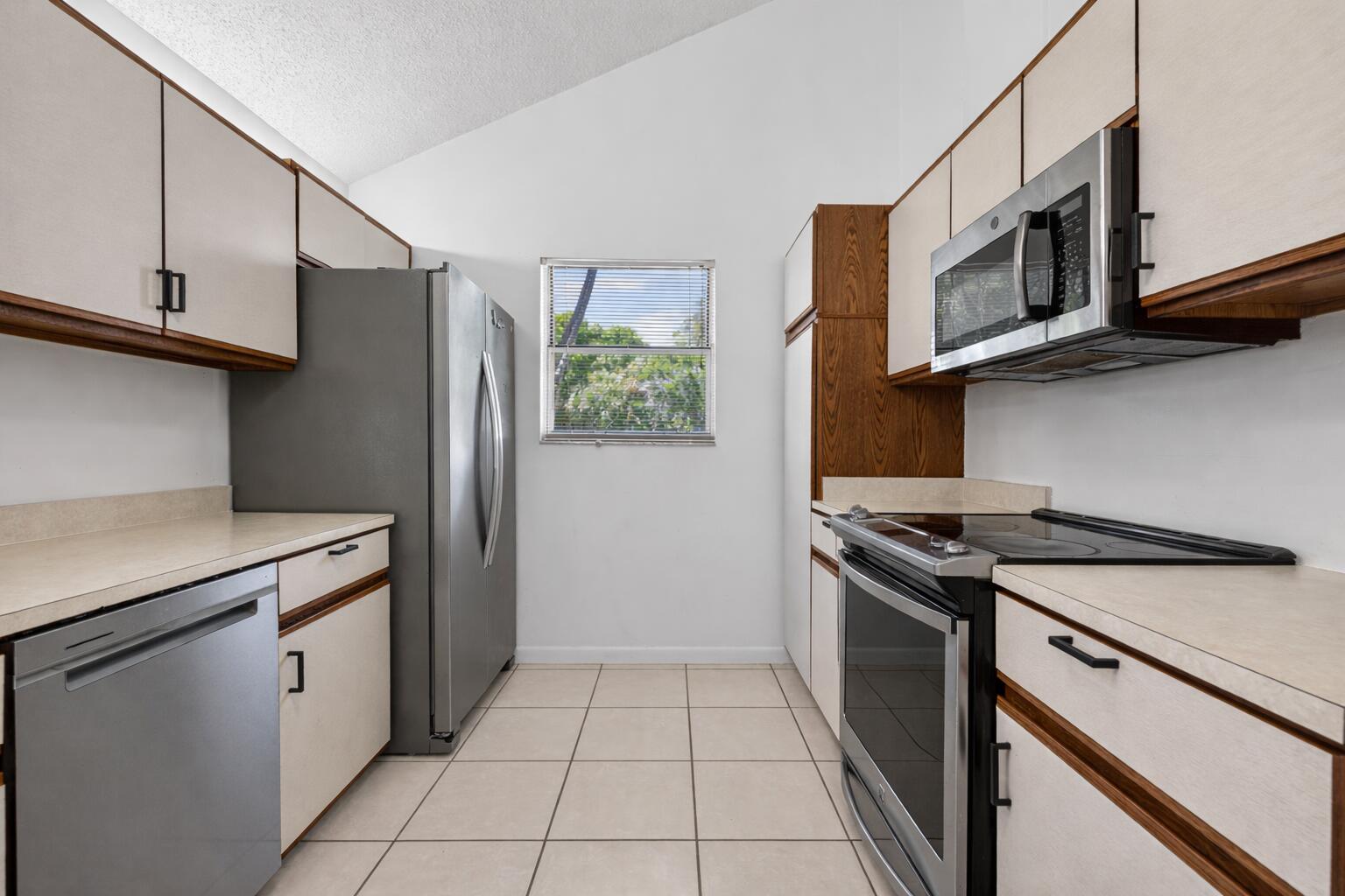 102 Maplecrest Circle Jupiter, FL 33458 - Photo 9 of 39 open kitchen