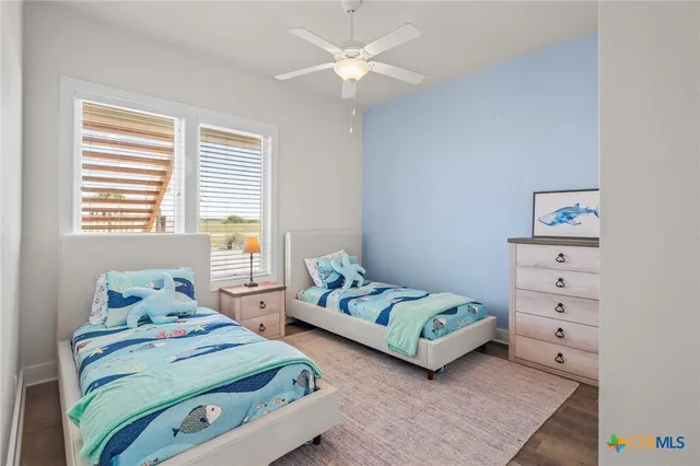 a view of a field with an ocean