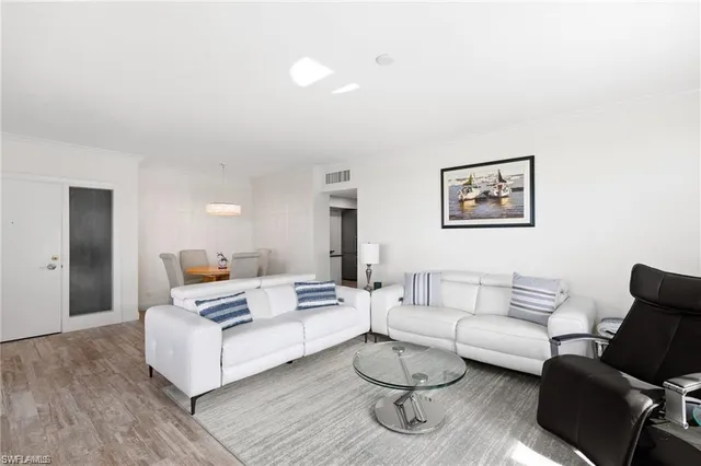 a living room with furniture and a couch