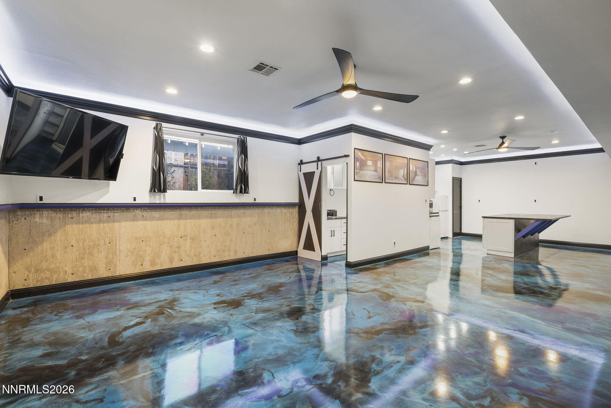 474 West Plumb Lane Reno, NV 89509 - Photo 17 of 35 a view of a livingroom with wooden floor and stairs
