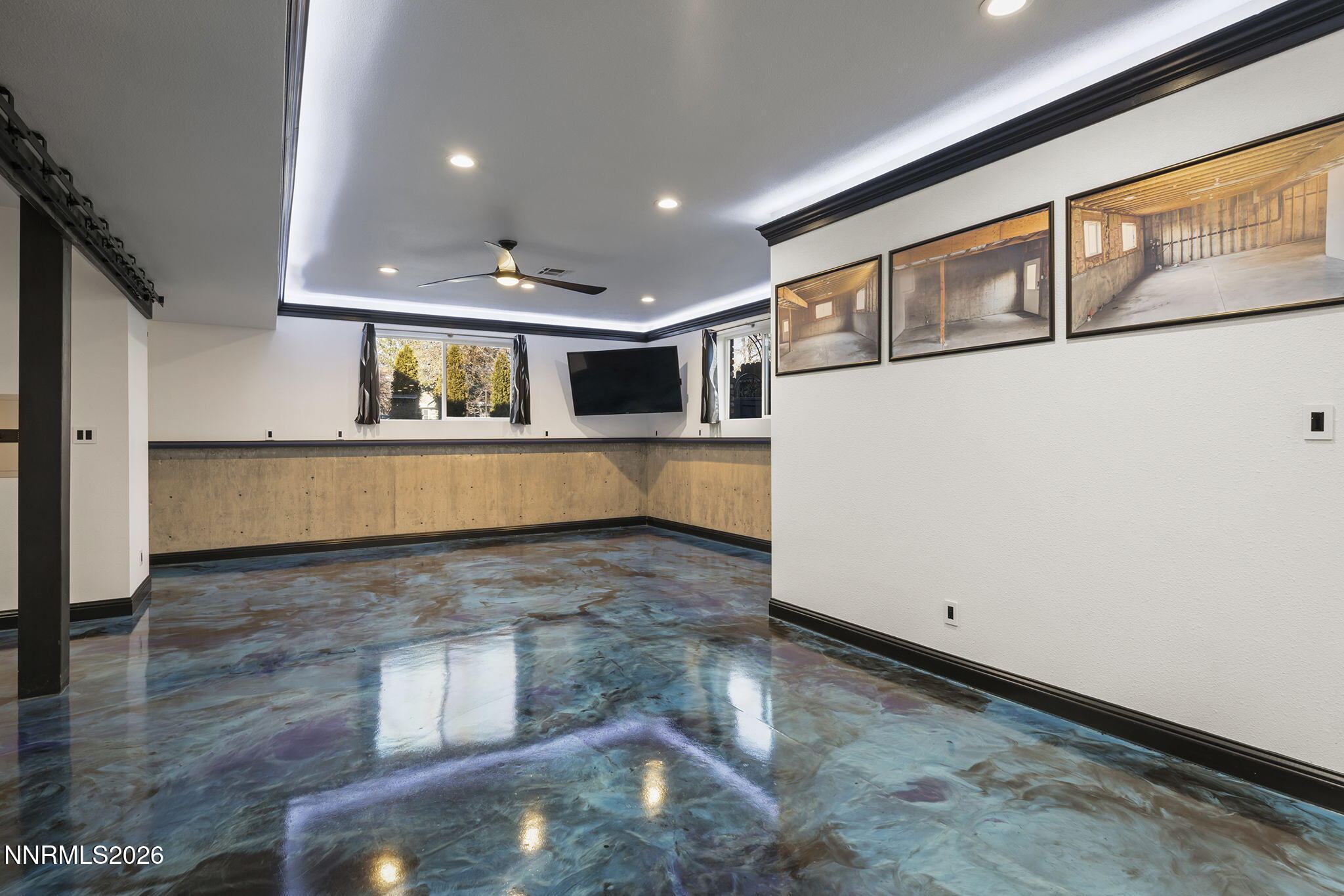 474 West Plumb Lane Reno, NV 89509 - Photo 20 of 35 a view of a big room with wooden floor and windows