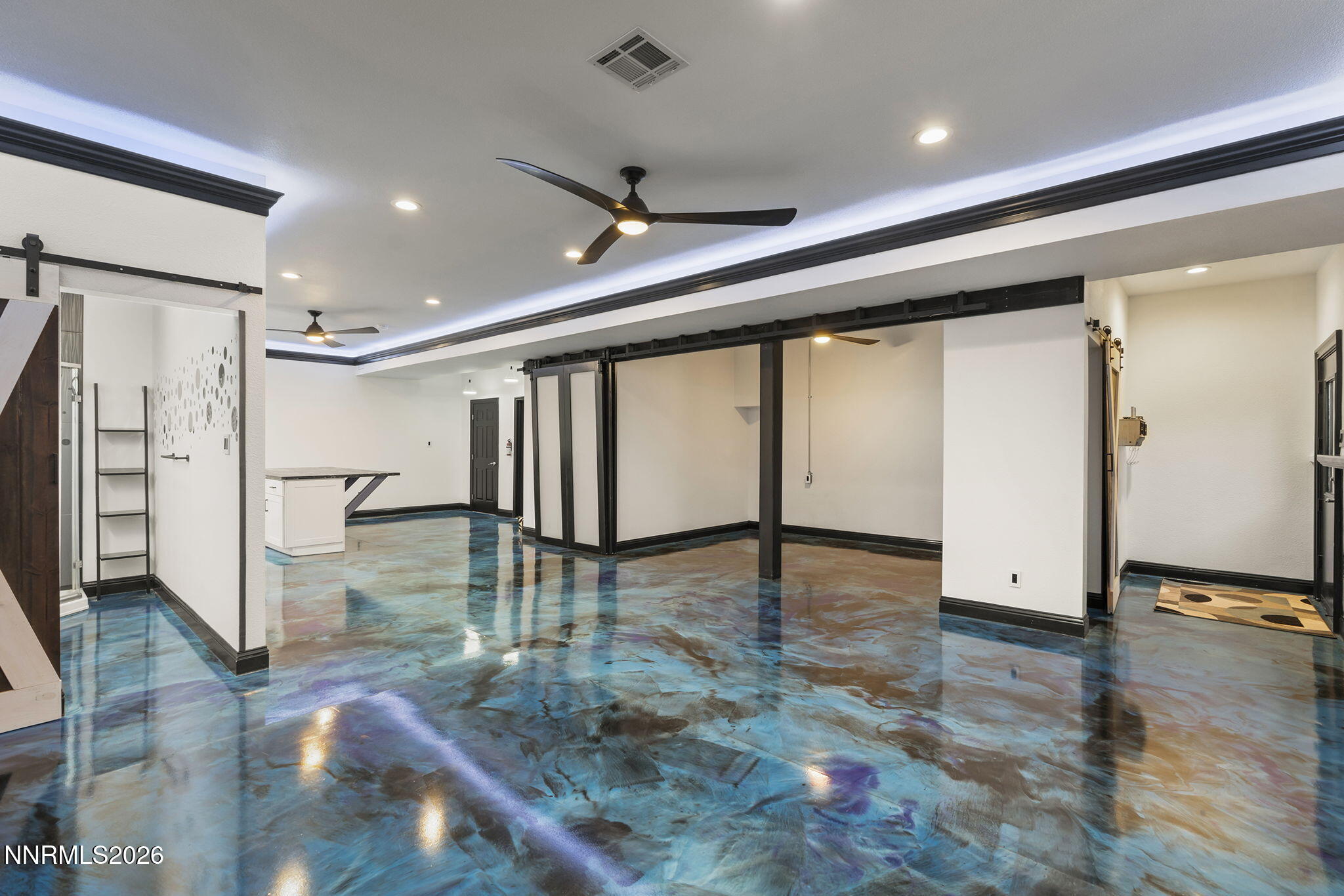 474 West Plumb Lane Reno, NV 89509 - Photo 22 of 35 a view of an empty room with wooden floor and a window