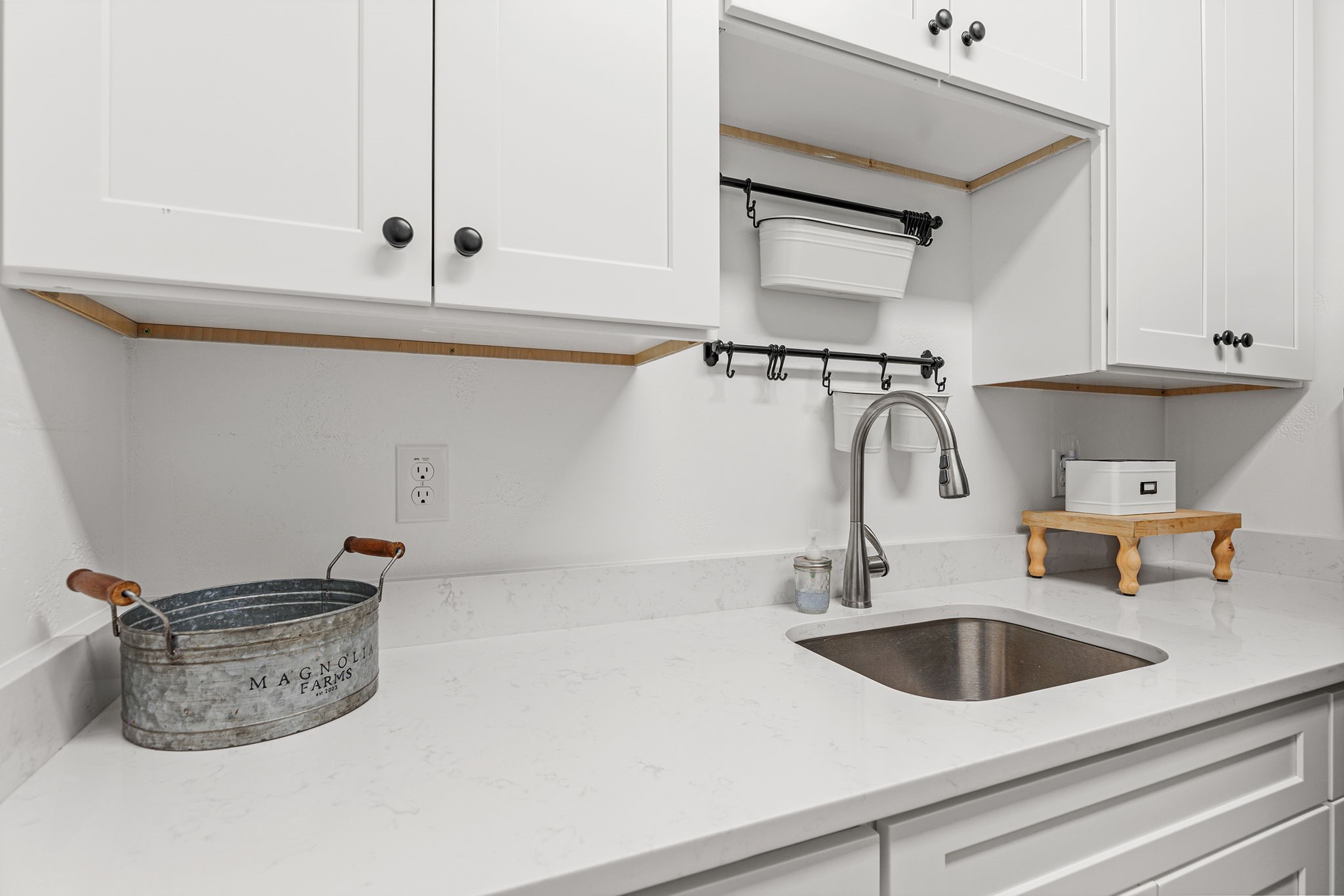 345 Judge's Road Burnet, TX 78611 - Photo 15 of 40 a kitchen with a sink and cabinets