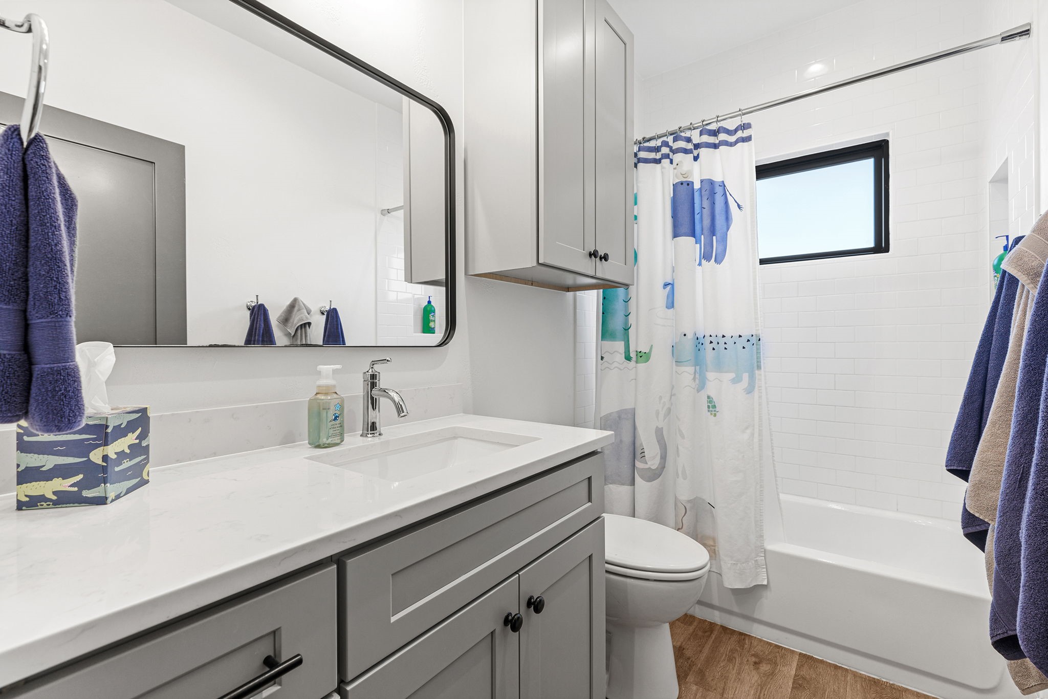 345 Judge's Road Burnet, TX 78611 - Photo 24 of 40 a bathroom with a sink a toilet and a mirror