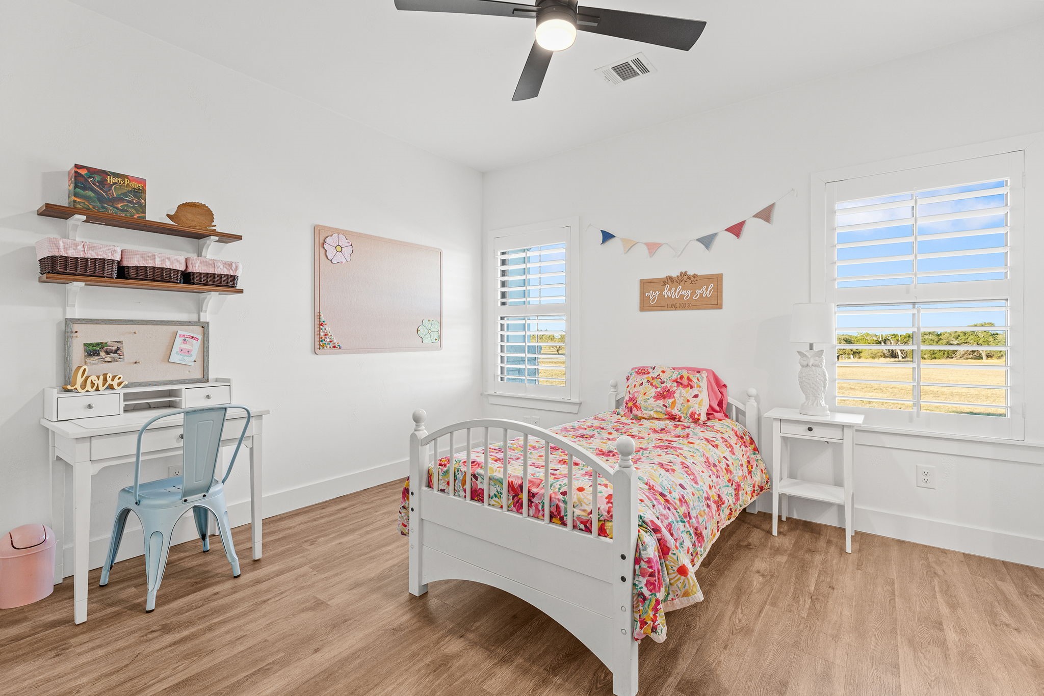345 Judge's Road Burnet, TX 78611 - Photo 25 of 40 a bedroom with a bed and a table in it