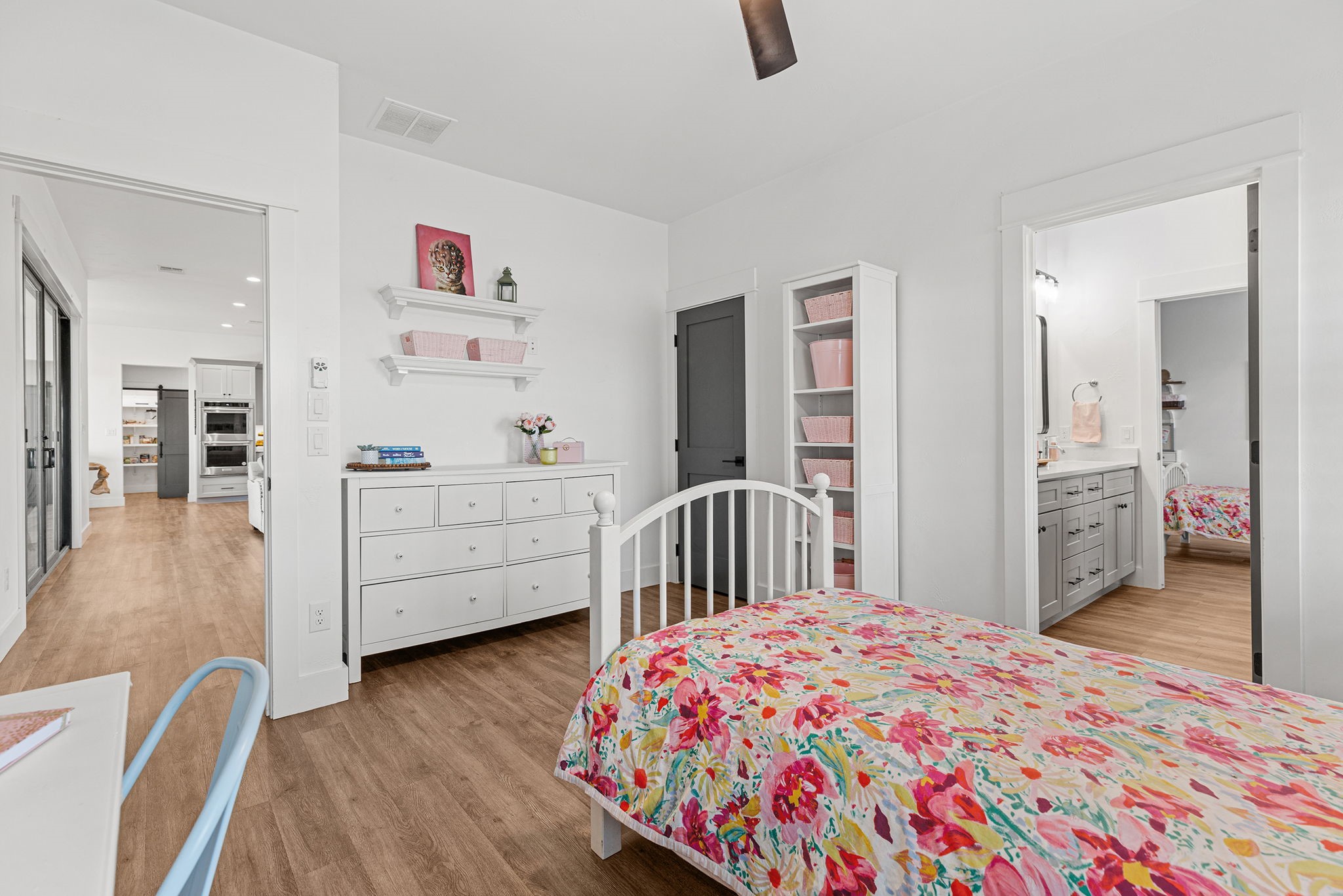 345 Judge's Road Burnet, TX 78611 - Photo 27 of 40 a bedroom with a bed and a view of kitchen