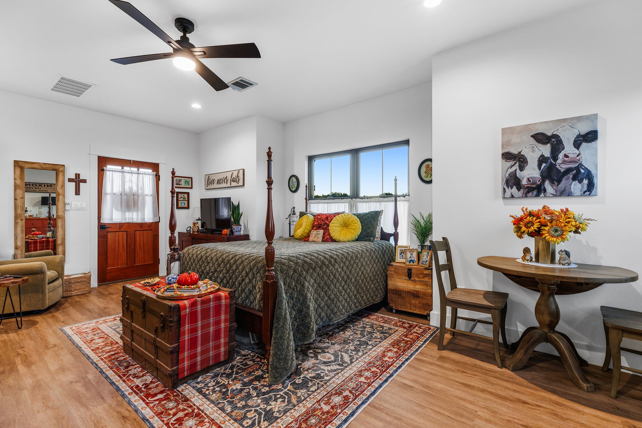 345 Judge's Road Burnet, TX 78611 - Photo 30 of 40 a bedroom with a bed and wooden floor
